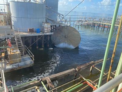 Hilcorp Energy oil storage tank in water